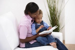 toddler-and-mother-reading-a-story (istock)