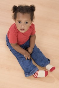 Children sitting with their legs in front of them instead of W sitting