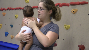 Parents might slowly tap baby's back to burp a baby